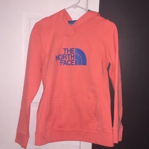 Bright pink and blue North Face hoodie